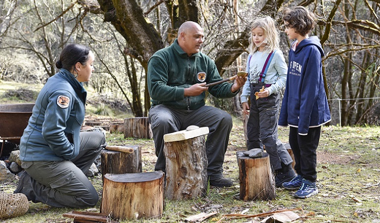 Guides sharing their culture with children, Kosciuszko National Park. Photo: Adam Hollingworth/DPIE