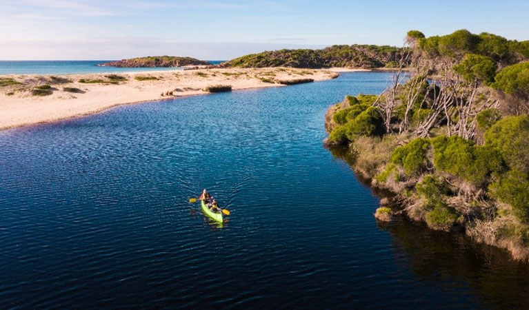 2 people canoeing along Bournda Lagoon in Bournda National Park. Photo: &copy; Daniel Tran