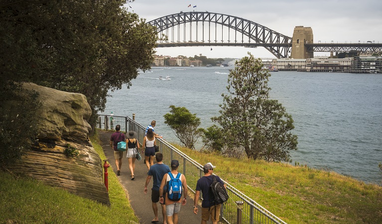 People walking along the path at Goat Island, Sydney Harbour National Park. Photo: John Spencer &copy; DPIE
