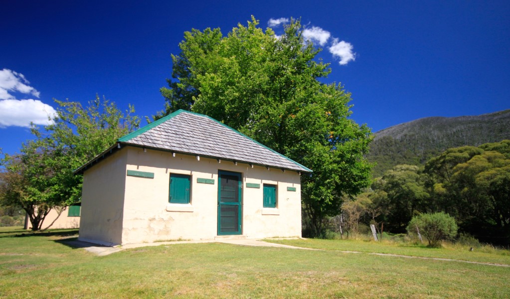 Bullocks Hut sits by the Thredbo River in the green alpine scenery of Kosciuszko National Park. Photo: Elinor Sheargold/DCCEEW &copy; OEH