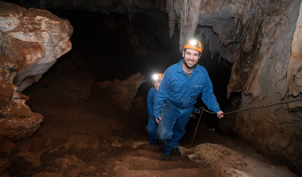 Adventure tour group exploring the caves at Jenolan. Photo: Jenolan Caves &copy; DPE