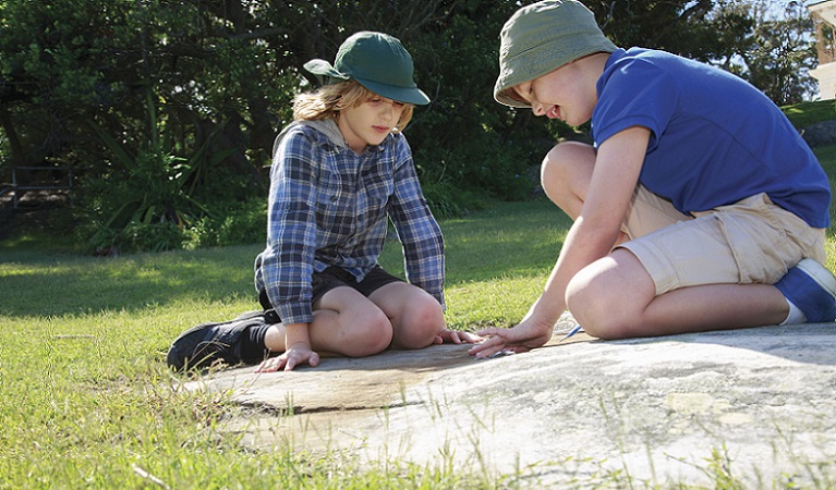 Two young boys an a nature play activity. Photo: Rosie Nicolai/OEH