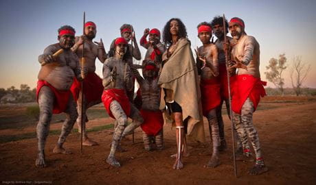 A group of Aboriginal dancers wearing red attire at the Mutawintji Cultural Festival. Credit: Andrew Hull &copy; Andrew Hull