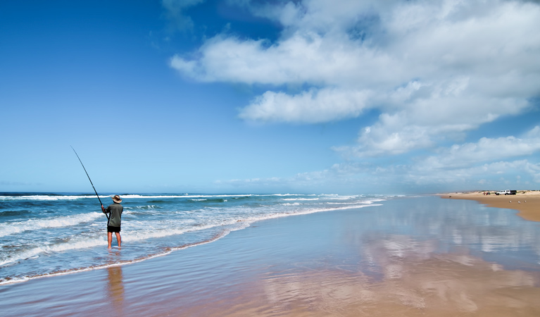 Person beach fishing, Worimi Conservation Lands. Photo: John Spencer