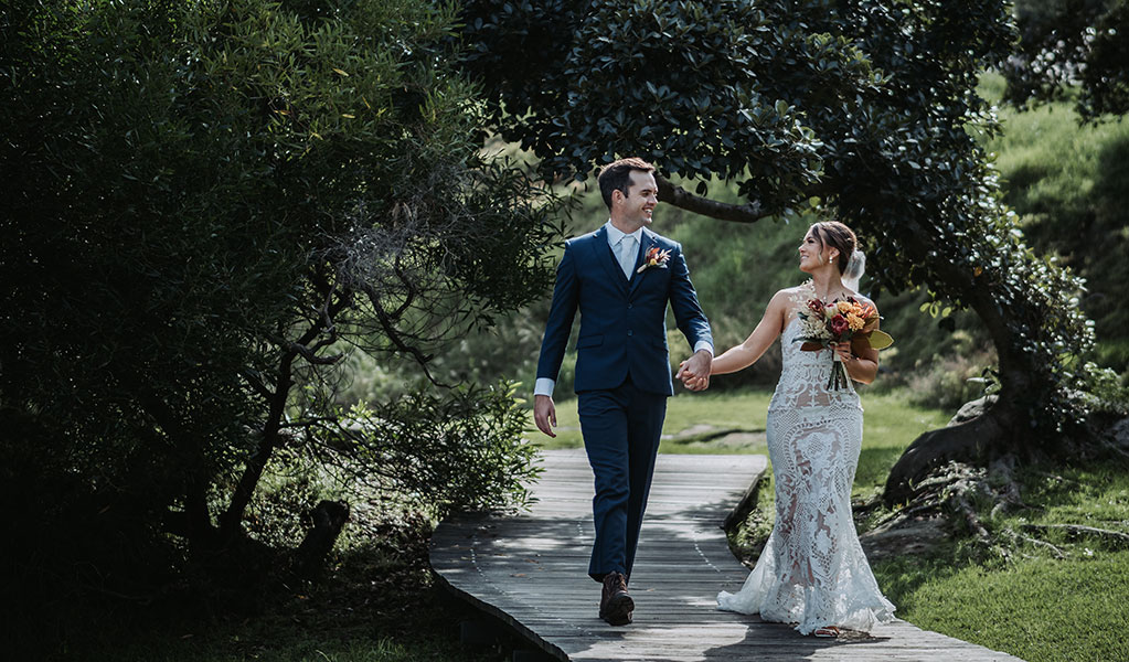 A couple celebrating their wedding at Sydney Harbour National Park. Photo: Matthew Horspool &copy; DPIE