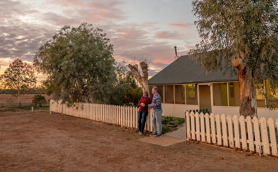 A couple outside Mount Wood Homestead, Sturt National Park. Image credit: John Spencer © DPIE