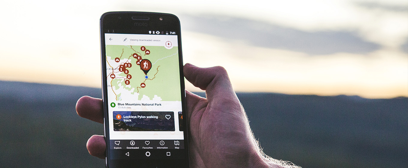 Visitor using app in Blue Mountains National Park. Photo: Daniel Parsons/Caravel Content
