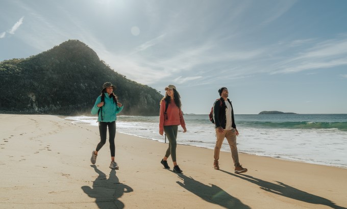 People walking on Zenith Beach on the Tomaree Coastal Walk. Credit: Remy Brand/DPE &copy; Remy Brand