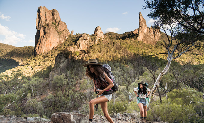 Walkers on the Breadknife and Grand High Tops walk in Warrumbungle National Park. Photo: Robert Mulally &copy; DPE
