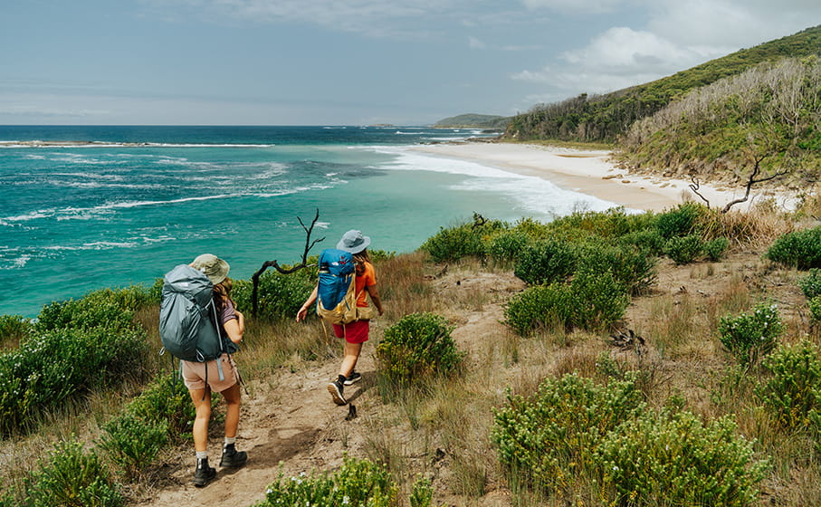 2 walkers on the Murramarang South Coast Walk. Credit: Remy Brand/DPE &copy; Remy Brand