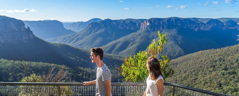 Bushwalkers take in lookout views at the start of Govetts Leap descent near Blackheath, in Blue Mountains National Park. Photo: Simone Cottrell/DPIE