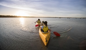 A family canoeing on the Murray River, Murray Valley National Park. Photo: Boen Ferguson/OEH