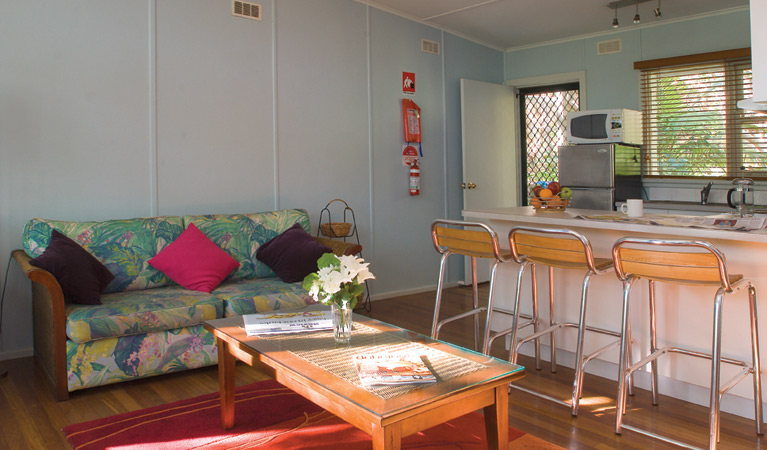 Living Room, Little Bay Cottage, Arakoon National Park. Photo: Michael van Ewijk/DPIE