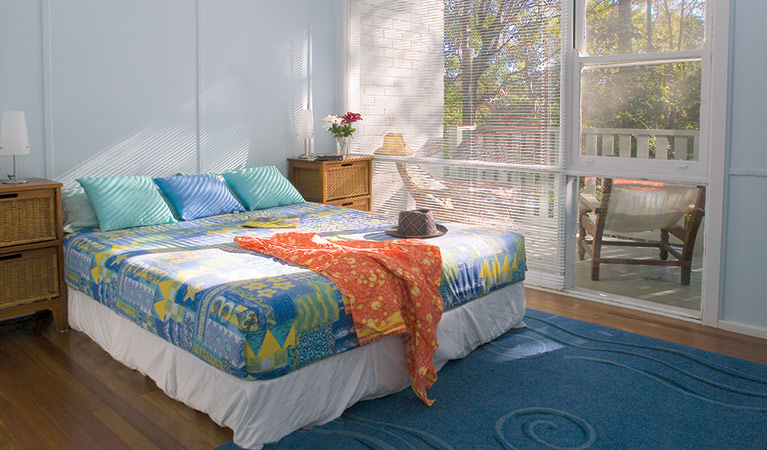 Master bedroom, Little Bay Cottage, Arakoon National Park. Photo: Michael van Ewijk/DPIE