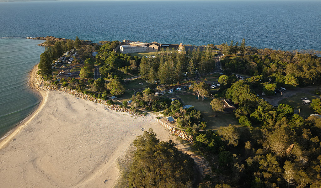 Aerial view of Trial Bay Gaol campground and Front Beach. Credit: Glen Ellis &copy; DCCEEW