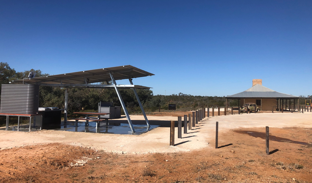 Picnic tables and barbecue under a shelter at Teilta campground and picnic area. Photo &copy; DPE