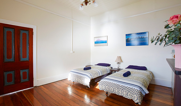 Twin beds in the Cottage 3 bedroom, Green Cape Lightstation Keeper's Cottages in Beowa National Park. Photo: Nick Cubbin/OEH