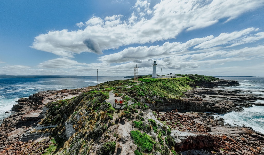 Visitors enjoy rugged coastal views from Green Cape lookout, Beowa National Park. Credit: Daniel Parsons/DCCEEW &copy; Daniel Parsons
