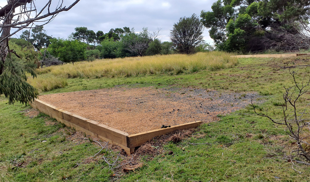 Gravel camping pad at Mowarry campground, Beowa National Park. Photo: DCCEEW, &copy; DCCEEW