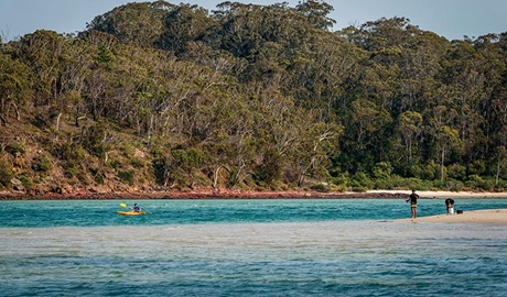 People kayaking and fishing at Severs Beach. Photo: John Spencer/DPIE