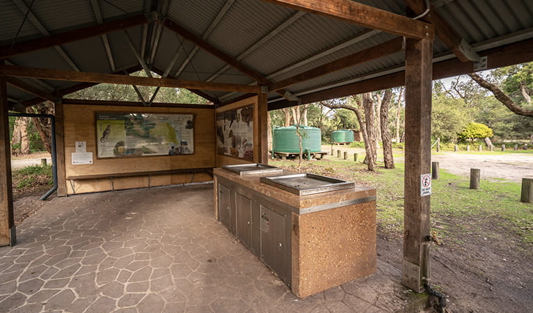 Barbecue facilities with shelter at Saltwater Creek campground, Beowa National Park. Photo: John Spencer/OEH
