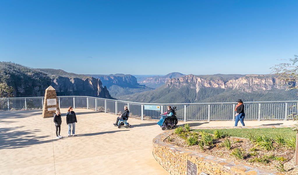Visitors at Govetts Leap lookout in Blue Mountains National Park. Simone Cottrell/DPE &copy; DPE