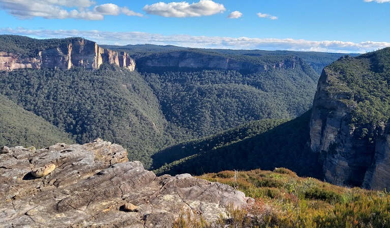 Rock shelf overlooking view of the Grose Valley,  with mountains and steep sandstone cliffs. Photo: Dave Noble &copy; OEH