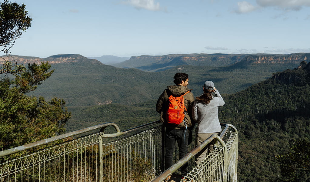 2 walkers enjoying the view from Golf Links lookout on Pool of Siloam walk, Blue Mountains National Park. Photo: Remy Brand &copy; Remy Brand