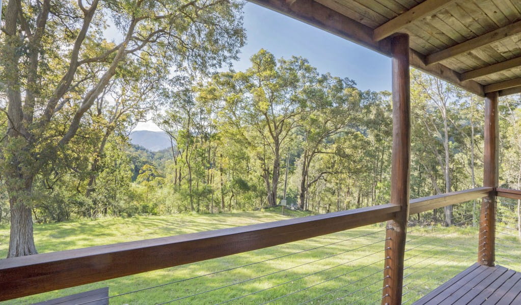 The view from the verandah of Galong cabins overlooking Megalong Valley in Blue Mountains National Park. Photo: Simone Cottrell &copy; DPIE