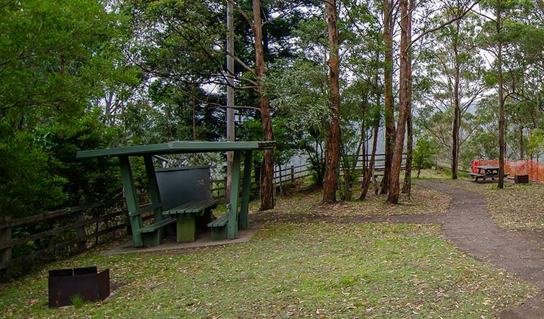 Sheltered picnic table at Border Loop lookout and picnic area in Border Ranges National Park. Photo credit: John Spencer &copy; DPIE