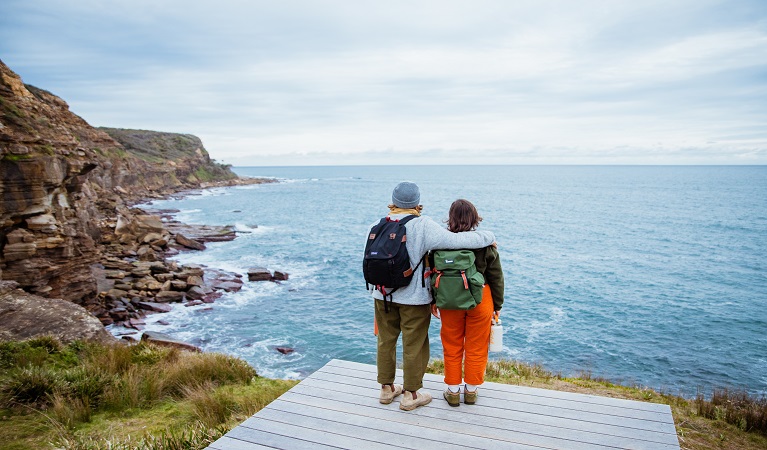 Visitors stop to take in ocean views at Dadar lookout, Bouddi National Park. Photo: Jared Lyons © DPE