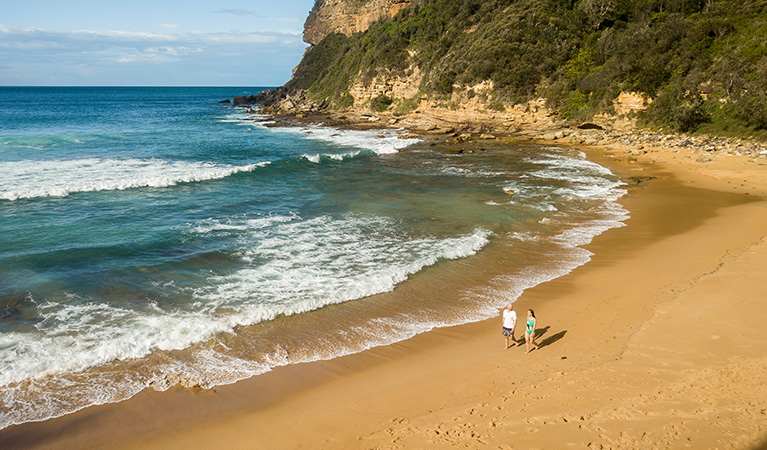 Aerial view of 2 people walking along Little Beach, Bouddi National Park. Photo: John Spencer/DPIE.