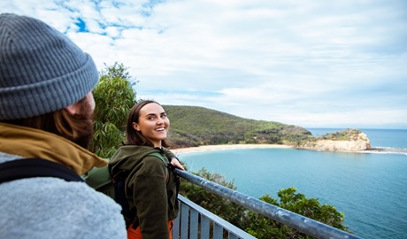 Visitors enjoying panoramic coastal views from Marang lookout, Bouddi National Park. Photo: Jared Lyons © DPE