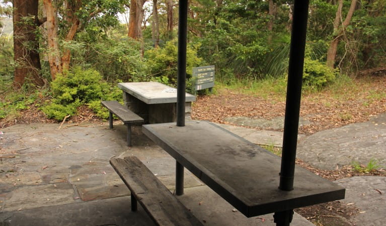 The picnic tables under a shelter at Mount Bouddi (Dingeldei) picnic area in Bouddi National Park. Photo: John Yurasek &copy; OEH