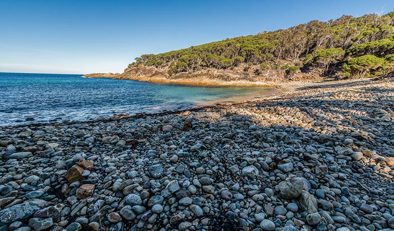 A beautiful bay with a pebbly beach along Kangarutha walking track. Photo: John Spencer &copy; OEH