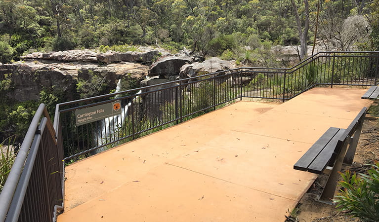 Valley View lookout platform surrounded by bushland, with Carrington Falls in the background. Photo credit: Jacqueline Devereaux &copy; DPIE