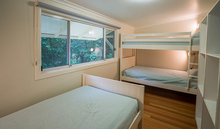 Single and bunk beds in Forest House, Bundjalung National Park. Photo: J spencer/OEH