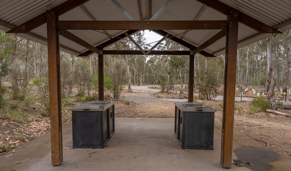 The sheltered barbecues at Bungonia campground, Bungonia National Park. Photo: John Spencer &copy; DCCEEW 