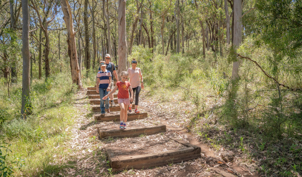 A family walking in Burning Mountain Nature Reserve. Credit: John Spencer &copy; DPE