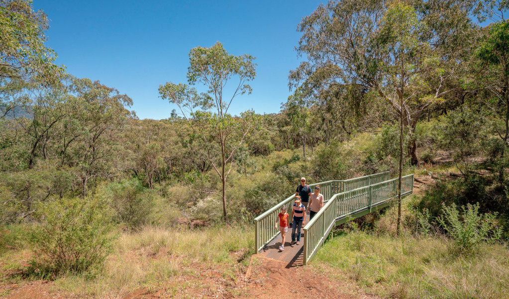 Family walking in Burning Mountain Nature Reserve walking track. Credit: John Spencer &copy; DPE 