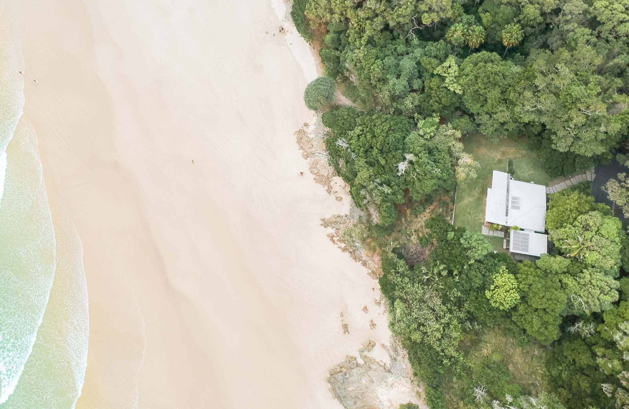 Aerial view of Thomson Cottage next to the beach. Photo: Sera Wright/DPIE