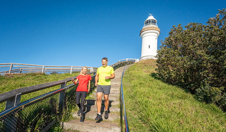 2 people jogging on Cape Byron walking track. Photo: John Spencer &copy; OEH