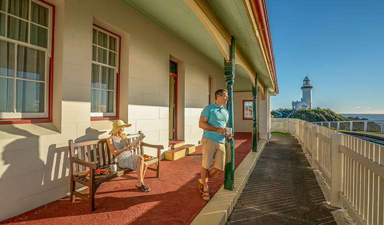 A couple relax on the verandah of the Assistant Lighthouse Keepers Cottage. John Spencer/DPIE