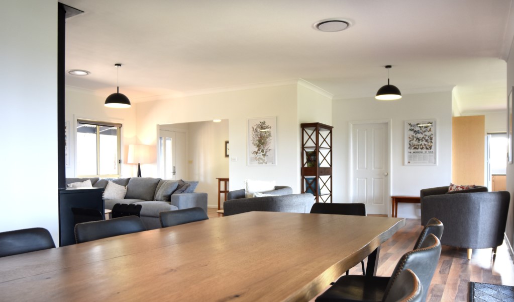 The open-plan living and dining area in Honeyeater Homestead, Capertee National Park. Photo: Steve Garland &copy; DPE