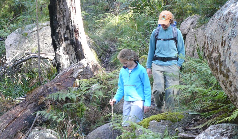 A family hikes among the rocks in Cathedral Rock National Park. Photo: B Webster