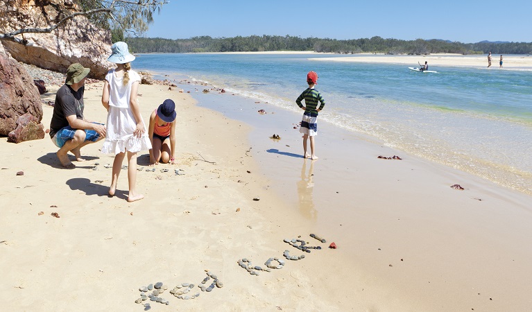 Children playing in the sand at Red Rock. Photo: Rob Cleary &copy; OEH