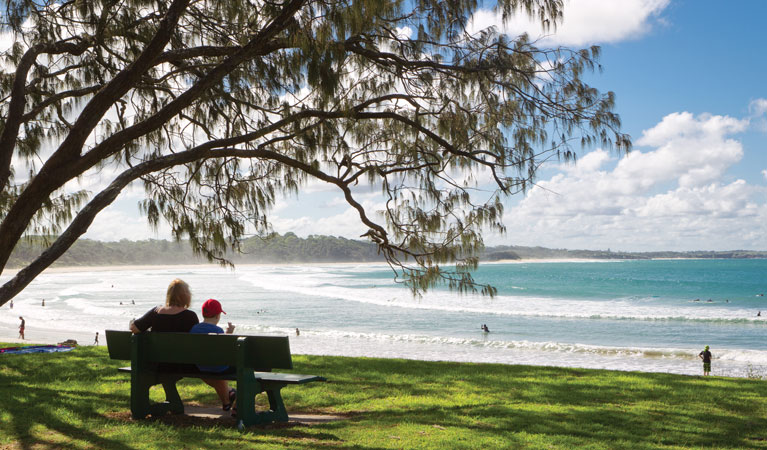 Sitting under a tree by Woolgoola Beach. Photo: Rob Cleary