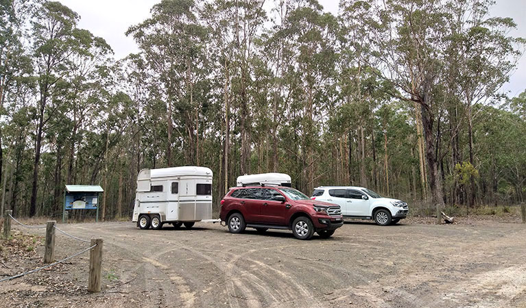 Vehicles and horse floats parked at Eagleton Road near Columbey horse riding trails in Columbey National Park. Photo: Liam Banyer &copy; DPIE