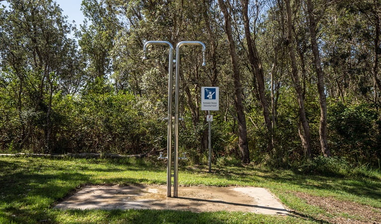 Outdoor rainwater shower at Crowdy Gap campground, Crowdy Bay National Park. Photo: Rob Mulally/DPIE