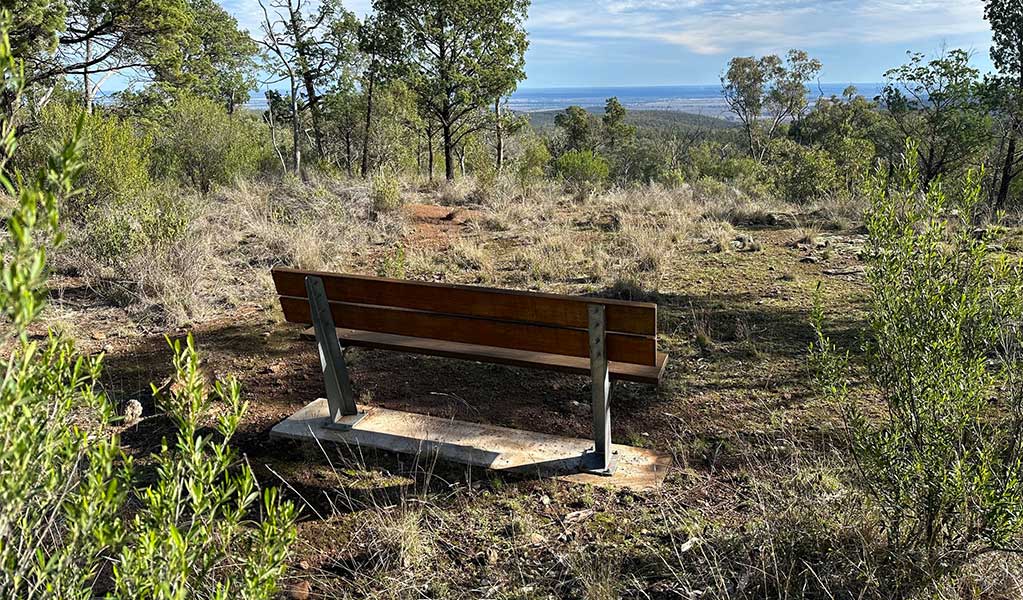 A seat along Birru Gabba Walking Track in Deriah Aboriginal Area. Credit: DCCEEW &copy; DCCEEW.